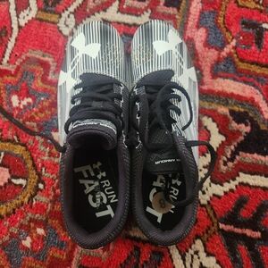 Under Armour Kids Black and White Striped Sneakers